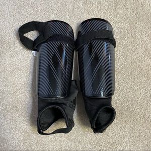Adidas size small shinguards black